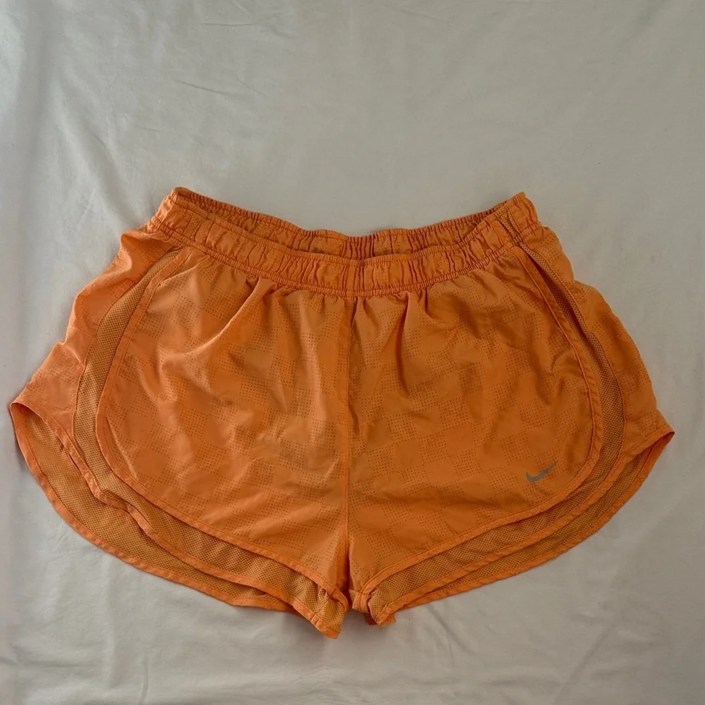 Nike Women's Vibrant Orange Athletic Shorts